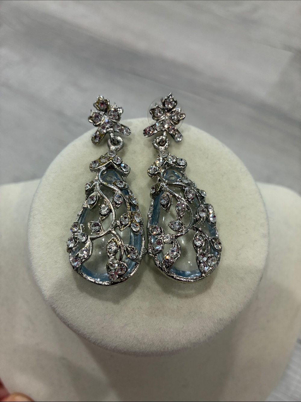 Silver Filigree Teardrop Crystal Earrings with Light Blue Accents